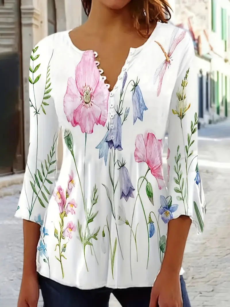 Fiorella – top met bloemenprint, knopen en uitlopende mouwen