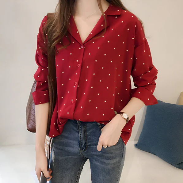 Leandra | speelse stippenblouse