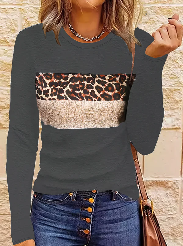 Emmi | het chique shirt met lange mouwen en luipaardprint