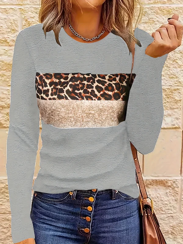Emmi | het chique shirt met lange mouwen en luipaardprint