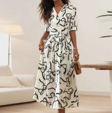 Aria – chique ivoorkleurige jurk