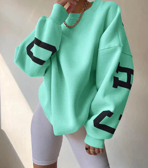 Oversized trendy trui met letters op de mouw voor dames