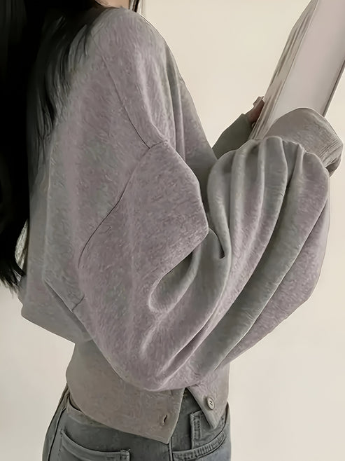 Letia | casual luxe: elegant T-shirt in effen kleur met knoopdetail