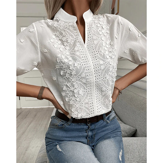 Holle kanten blouse met v-hals voor dames