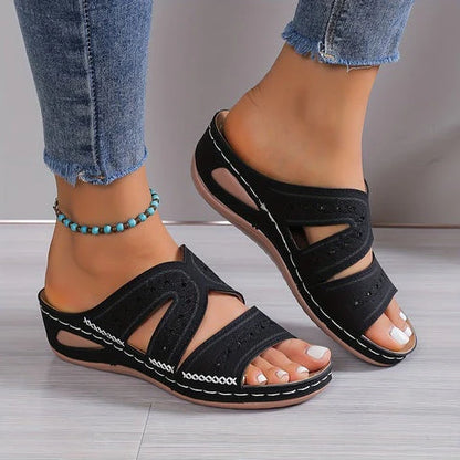 Ademende schoenen met leren bandjes