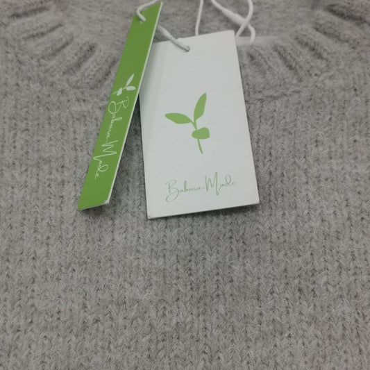 Oversized trui met ivoorkleurige voorzak en grote diepe zakken voor dames