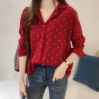 Leandra | speelse stippenblouse