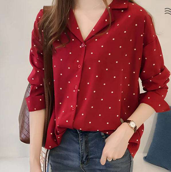 Leandra | speelse stippenblouse