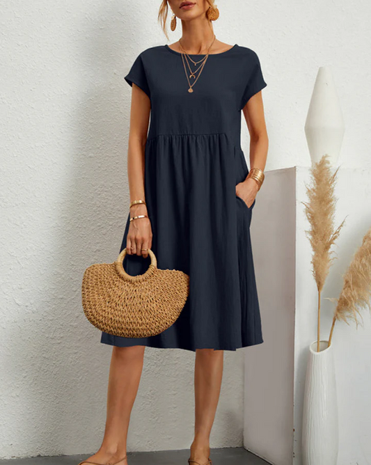 Comfortabele midi-jurk met ronde hals en zakken