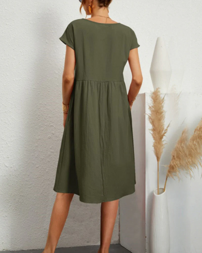 Comfortabele midi-jurk met ronde hals en zakken