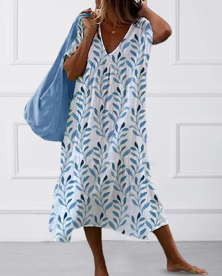 Boho midi-jurk met bladprint en vloeiende snit