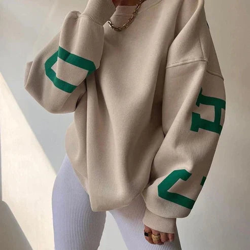 Oversized trendy trui met letters op de mouw voor dames