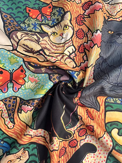 Naomi | speelse en kleurrijke top met kat en vlinder