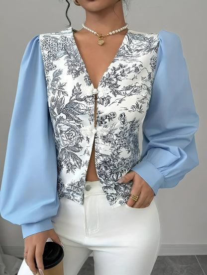 Rosalin | blouse met v-hals en lantaarnmouwen in een bloemenprint